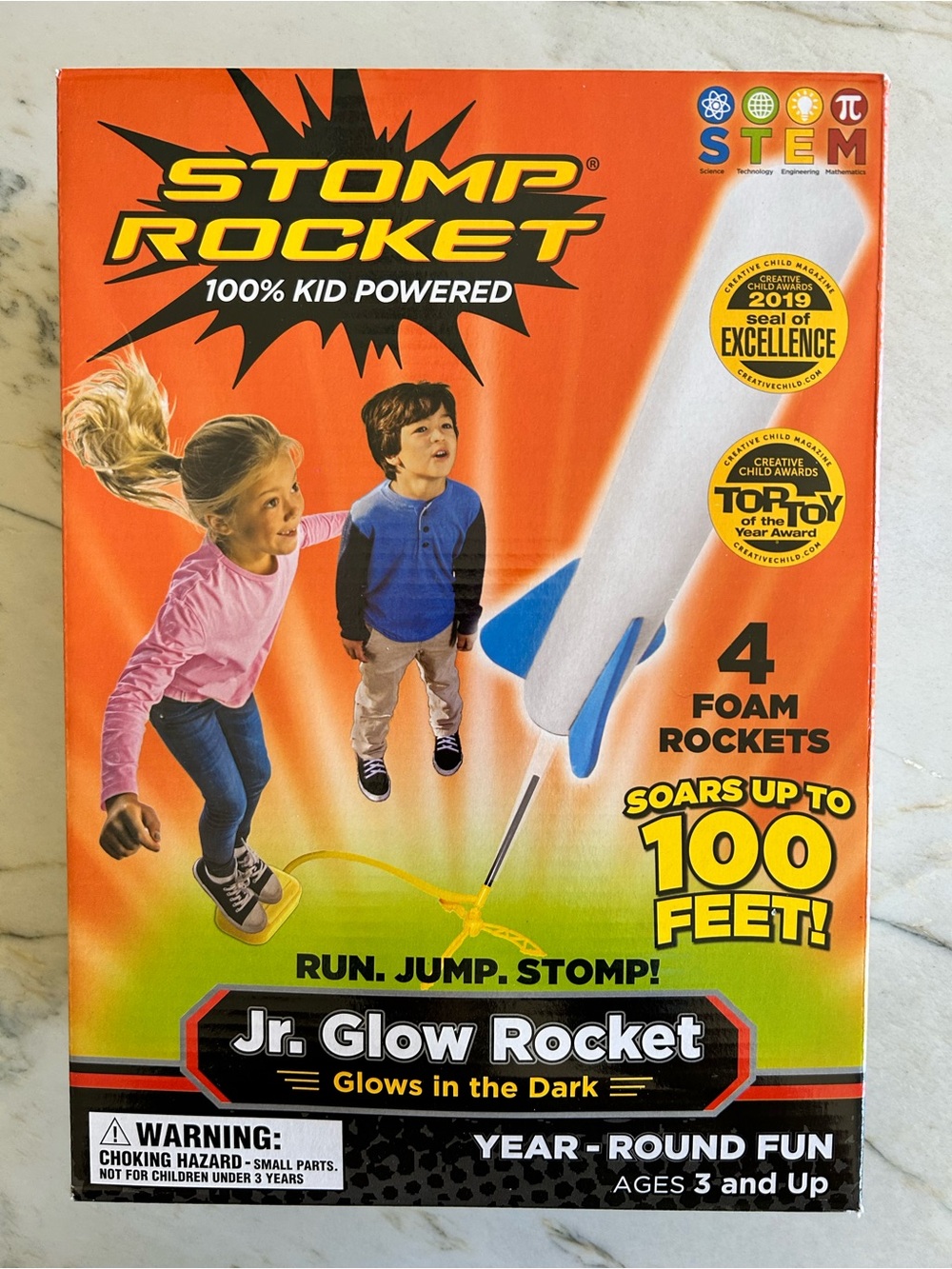 Stomp Rocket Jr. Glow Rocket - Orange Box, Blue & White Rocket